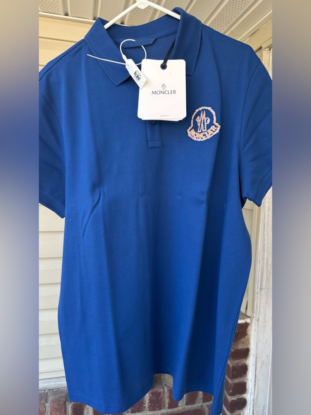 Moncler Blue Polo with Orange Embroidered Crest